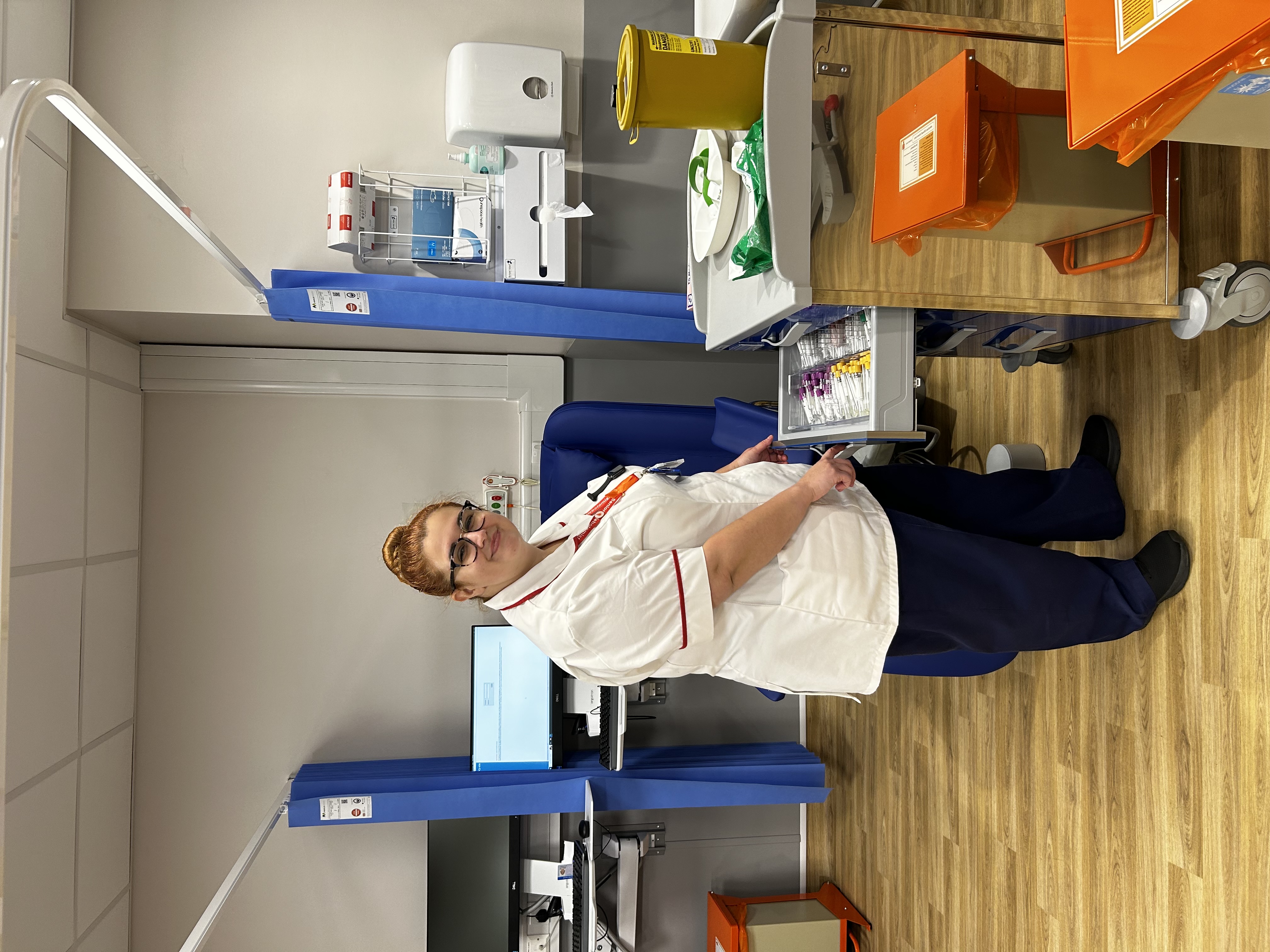 1.	Phlebotomist Alex Stringer in one of the new blood testing rooms at Halton Hospital