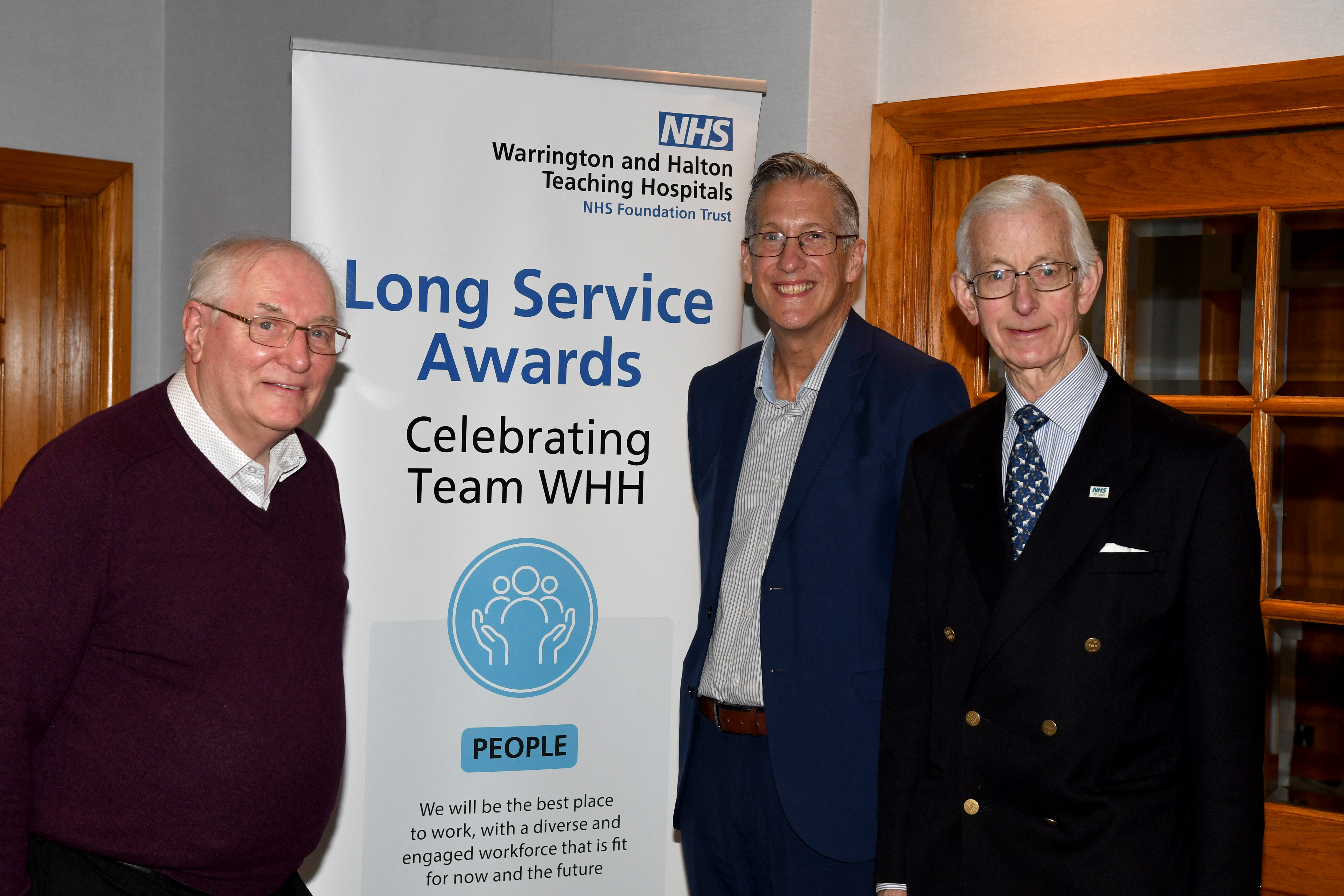 Keith Knowles and Dr Richard Briggs celebrate their 50-year service awards with Chief Executive Simon Constable.