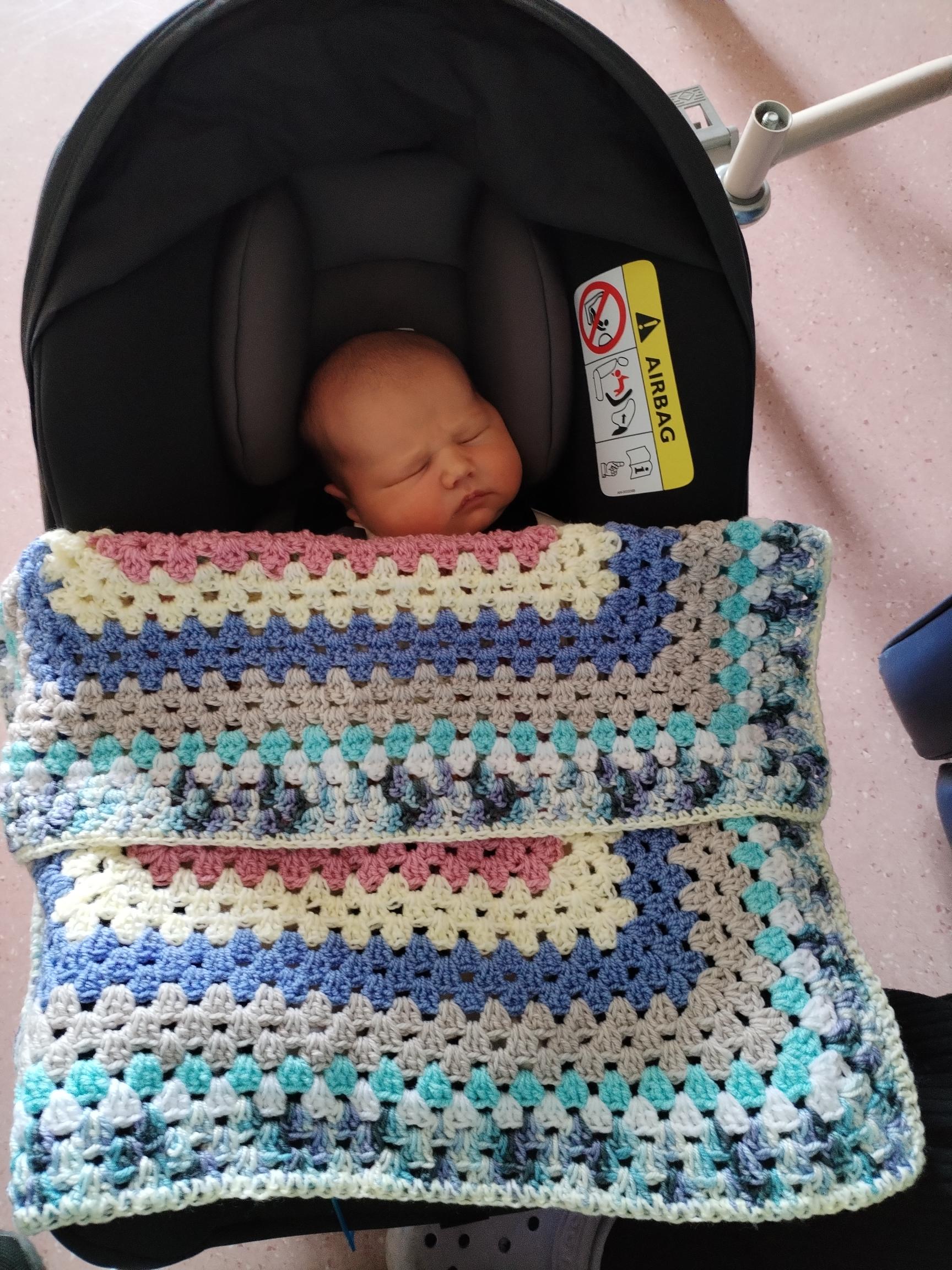 Leo Thwaites with his new blanket from the club.