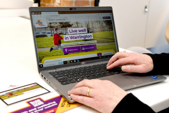 Laptop with living well hub website