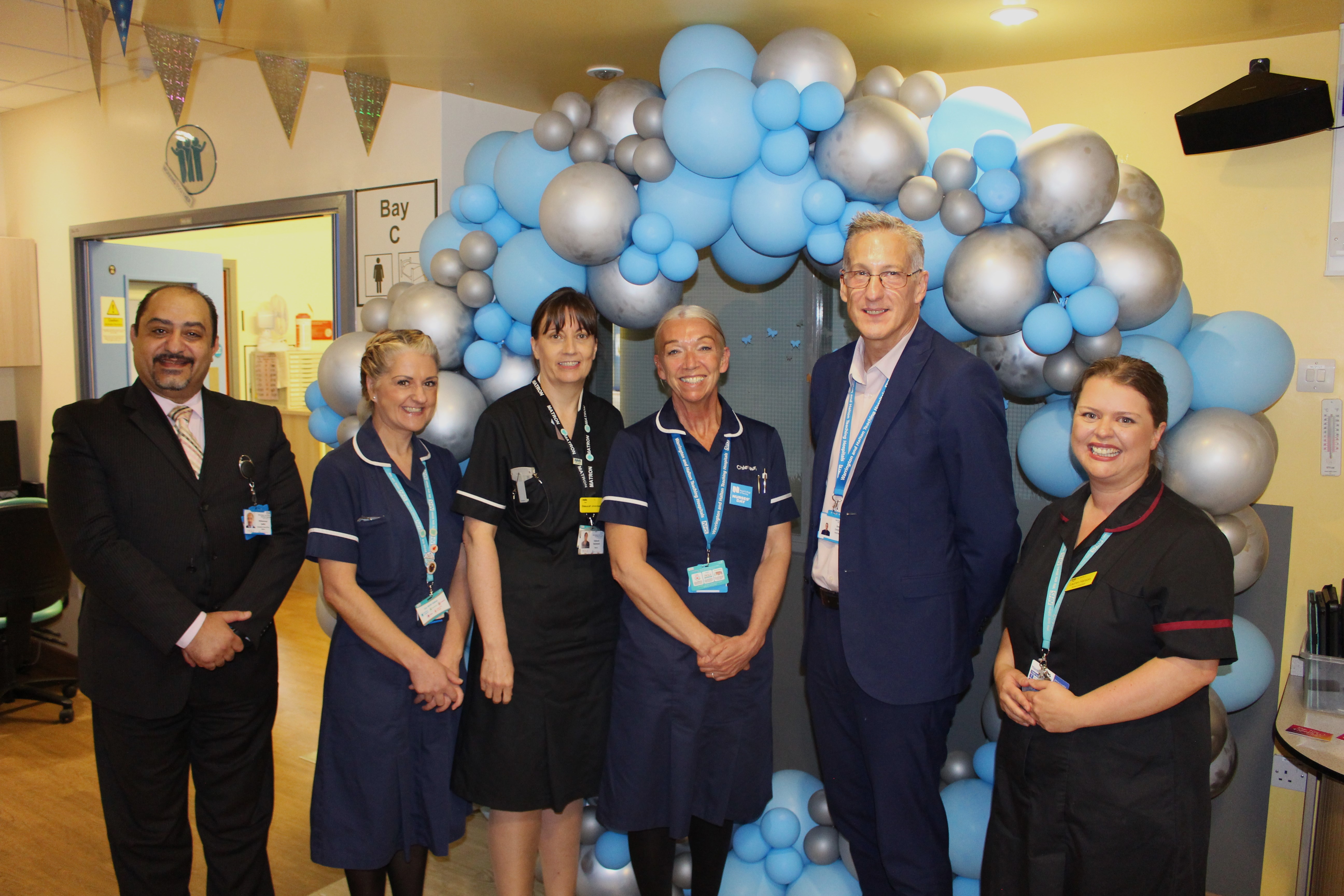 Photo of Chief Executive Simon Constable and Chief Nurse Ali Kennah with FMN ward staff.